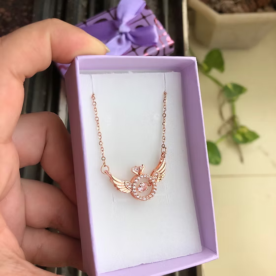 Winged neck chain